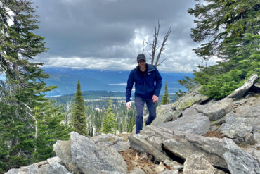 This photo shows the author wearing the Jack Wolfskin JWP Shell rain jacket during an alpine mountain hike during the testing process.