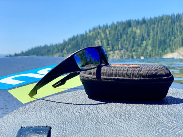 This photo shows the SPY+ Logan Sunglasses with Happy Boost that the author tested while fishing and paddleboarding.