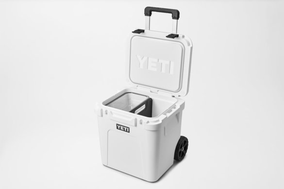 This photo shows the interior basket and divider in the YETI Roadie 48 cooler.