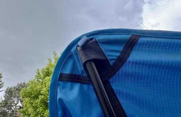 closeup photo of pull loop and pocket for support pole on the flexlite camp boss chair