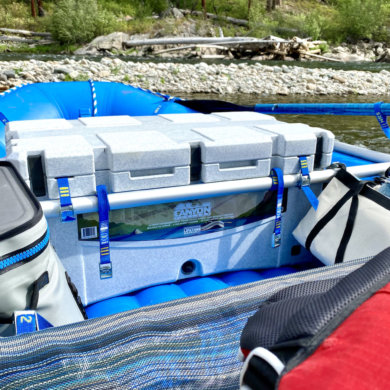 This photo shows the Canyon Coolers Prospector 103 cooler mounted in a whitewater raft frame on the Middle Fork of the Salmon River in Idaho during the review and testing process.