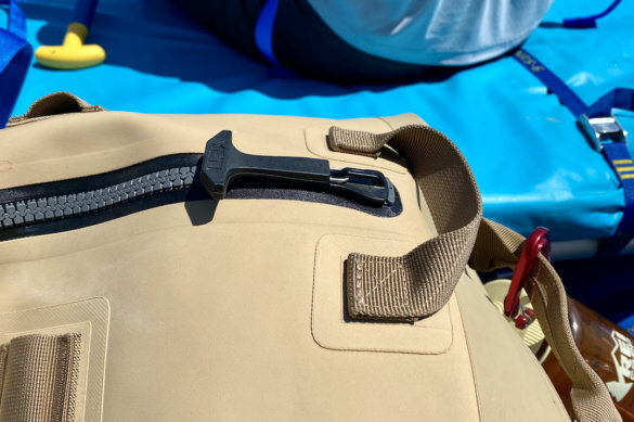 This review and testing photo shows a closeup of the YETI Panga waterproof zipper.