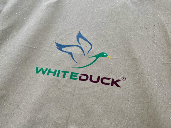 This photo shows the White Duck logo on the outside of the Regatta Bell Tent.
