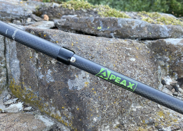 This photo shows the button on the PEAX Backcountry Z Sissy Stix that let them collapse or remain rigid.