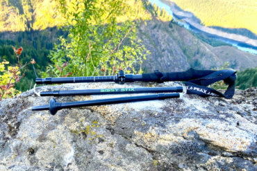 This photo shows the PEAX Backcountry Z Sissy Stix on a rock in rugged terrain during the testing and review process.