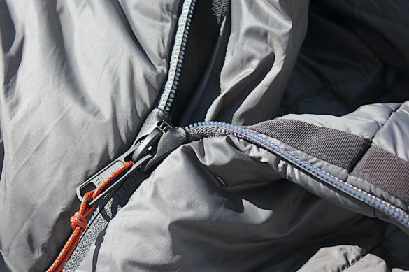 This photo shows a closeup of the main zipper on the Sitka Kelvin Aerolite 30 Sleeping Bag.