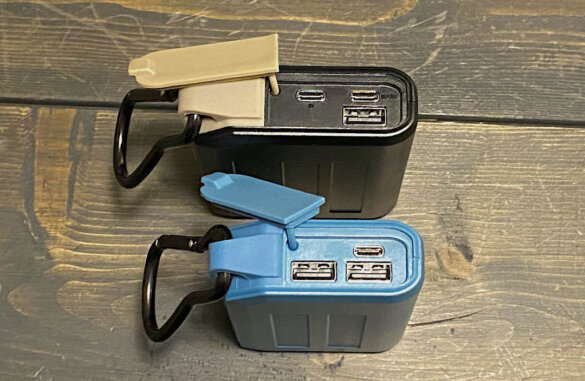 This photo shows the charging ports side-by-side on the myCharge Adventure H2O Turbo and Adventure H2O standard model.