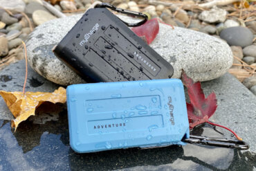 This photo shows the myCharge Adventure H2O Turbo and Adventure H2O waterproof chargers compared to each other with water droplets.