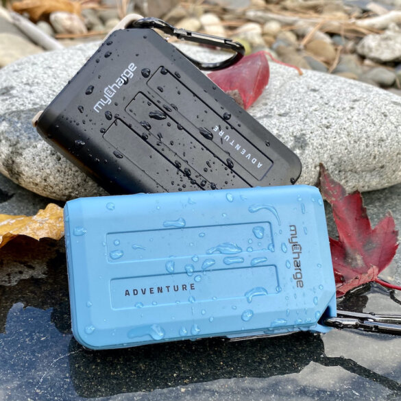 This photo shows the myCharge Adventure H2O Turbo and Adventure H2O waterproof chargers compared to each other with water droplets.