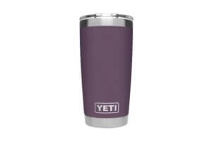 This photo shows the YETI Rambler drinkware travel mug in the Nordic Purple color option.