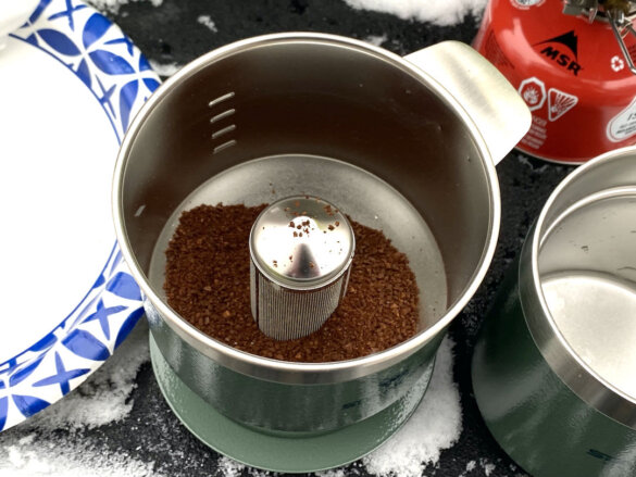 https://manmakesfire.com/wp-content/uploads/2022/12/stanley-class-perfect-brew-set-review-coffee-grounds-585x439.jpeg