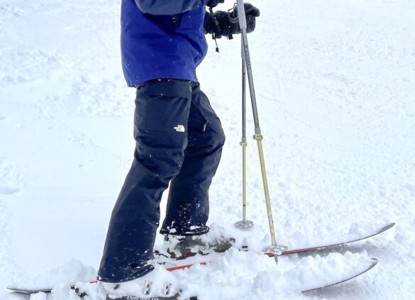 This photo shows the author wearing the uninsulated The North Face Freedom ski and snowboarding pants while skiing during the testing and review process.