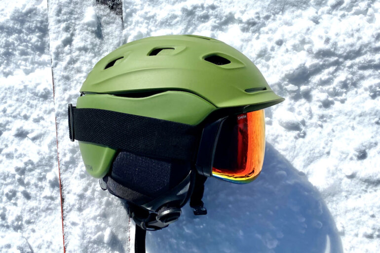 This photo shows the Smith Vantage MIPS Helmet with Smith 4D MAG Goggles outside on snow.