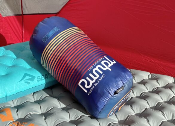 This review photo shows the Rumpl Original Puffy Blanket packed up in its included stuff sack.