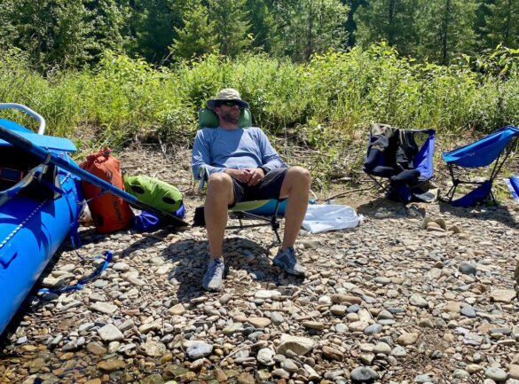 This photo shows the author napping in the Cascade Mountain Tech Hammock Chair.