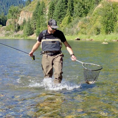 This review photo shows the author with a trout he caught while testing the Grundéns Boundary Stockingfoot Waders during the review process.