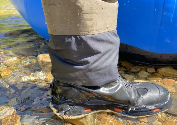 This photo show the author wearing the Grundéns Boundary Stockingfoot Waders while demonstrating how the new gravel guards look and function.