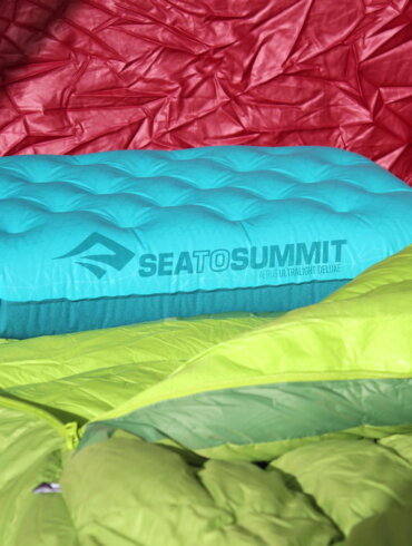 This review photo shows the Sea to Summit Ultralight Deluxe Pillow with a sleeping bag in a tent.