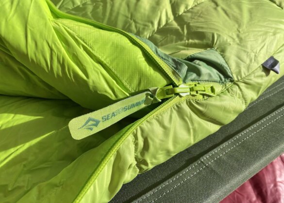 The review photo shows a closeup of the Sea to Summit Ascent Sleeping Bag zippers.
