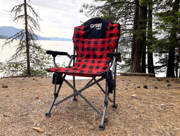 This review photo shows the Gobi Heat Terrain Heated Camping Chair next to a lake on a cold day when the author tested the camp chair for this review.