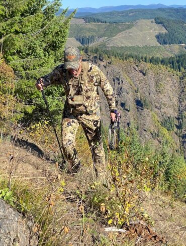 This photo shows the author wearing the Sitka Core Merino 120 LS Crew base layer shirt as his exterior layer during an archery elk hunt in Idaho on a mountainside during the testing and evaluation process.