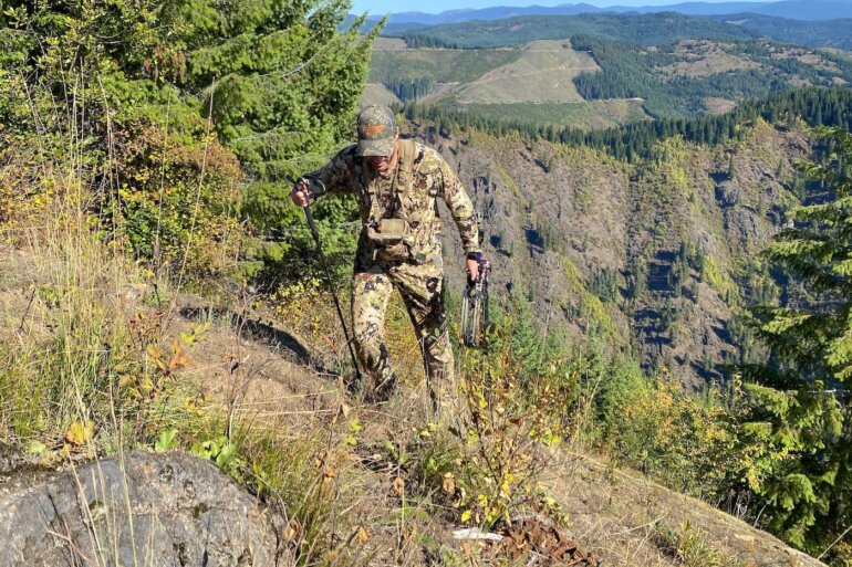 This photo shows the author wearing the Sitka Core Merino 120 LS Crew base layer shirt as his exterior layer during an archery elk hunt in Idaho on a mountainside during the testing and evaluation process.