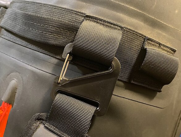 This review photo shows a closeup of the backpack strap attachment hook.