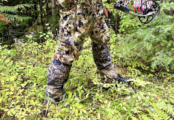 This hunter gear gift photo shows the author wearing Kenetrek Hunting Gaiters while archery elk hunting in a wet forest environment.