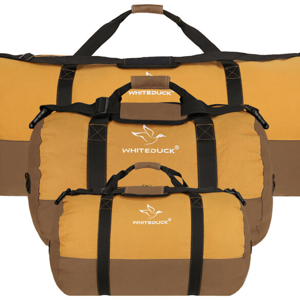 This photo shows the three sizes of the new White Duck Outdoors Filios Canvas Duffel Bags.