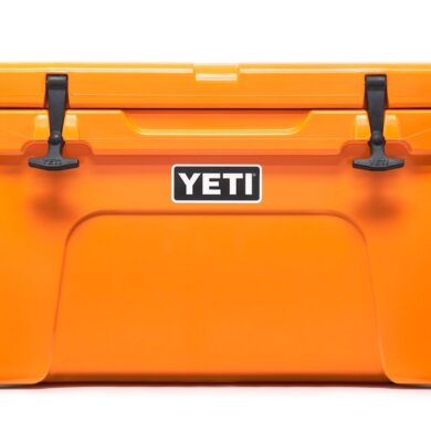 This product photo shows the YETI Tundra 45 Hard Cooler in the King Crab Orange color option.