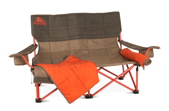 This outdoor gift buying guide photo shows the new Kelty Low Loveseat Nest camping chair in the 'Bungee Core/Beluga' color option.