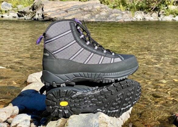 Patagonia Forra Wading Boots on a rock near a river.