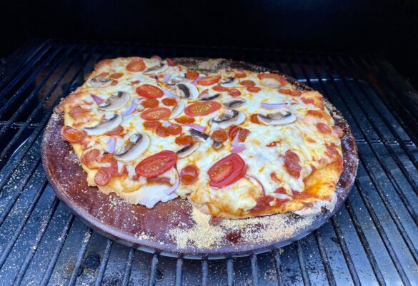 Homemade pizza on a Traeger pellet grill.
