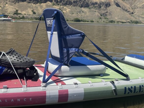 Closeup of Cloud Kayak Seat attached to inflated paddle board.