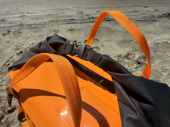 Closeup photo of the roll-top RUX Soft Cooler Bag closure system.