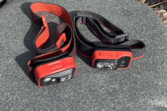 Previous generation Spot 350 next to new Spot 400 headlamp, showing differences in size and design.