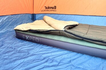 sleeping bag on Exped MegaMat air mattress inside a camping tent