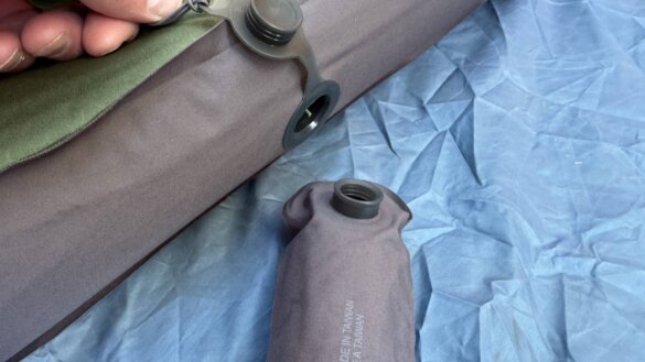 Closeup of IN valve and pump connection.