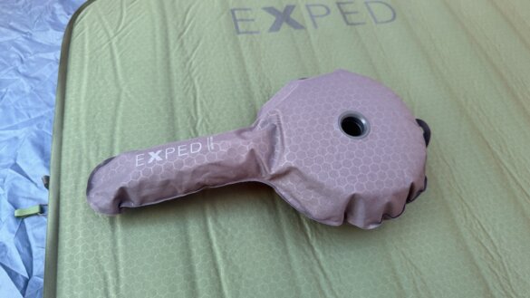 Foam hand pump for Exped MegaMat on top of inflated air mattress.