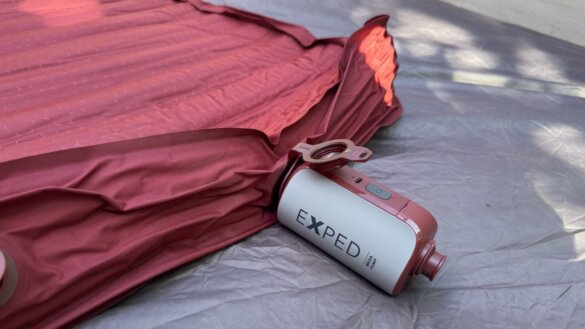 The Mega Pump deflating an Exped MegaMat Max air mattress.