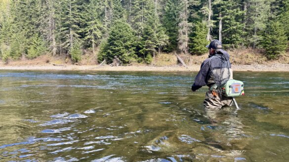 Chris Maxcer conducts real-world wading boot testing while fishing for cutthroat trout in an Idaho stream.