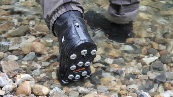 Aluminum Hex Disc studded rubber interchangeable sole option installed on Korkers Devil's Canyon wading boot.
