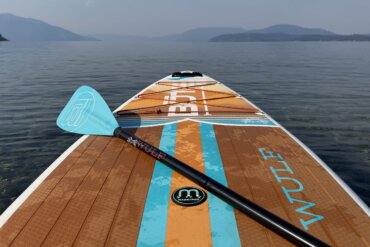 An inflated BOTE WULF Aero 11'4" iSUP floating on an Idaho lake during testing.