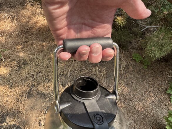 The author holds the RTIC Outback Jug by its rugged handle.