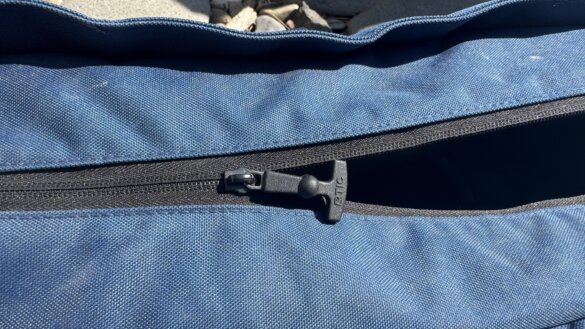 Closeup of the zipper on an RTIC everyday tote bag.