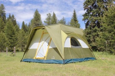 Acadia 6 Tent pitched in a sunny meadow.