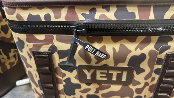 Close up of 'Pull Hard' tag on a new YETI Hopper Flip 18 soft cooler.